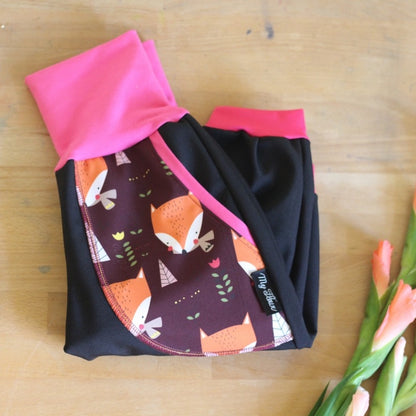 Black softshell trousers, pink foxes