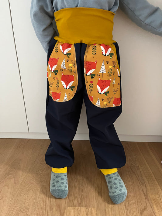 Softshell trousers, dark blue; foxes, yellow